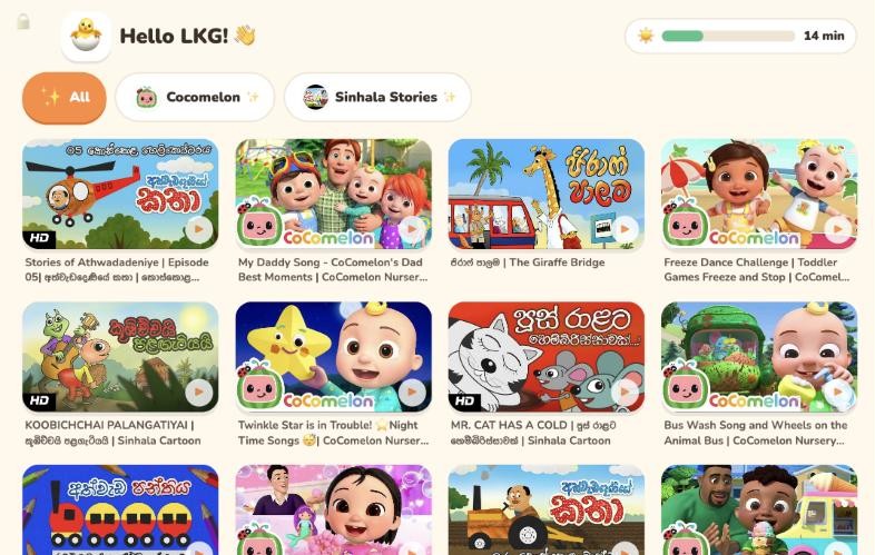 The real class screen: Hello LKG! with big pictures of Cocomelon and Sinhala stories.